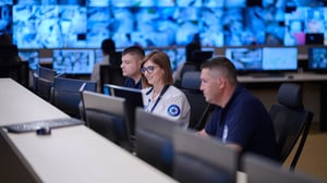 Group of Security Operators at Work Monitoring CCTV cameras