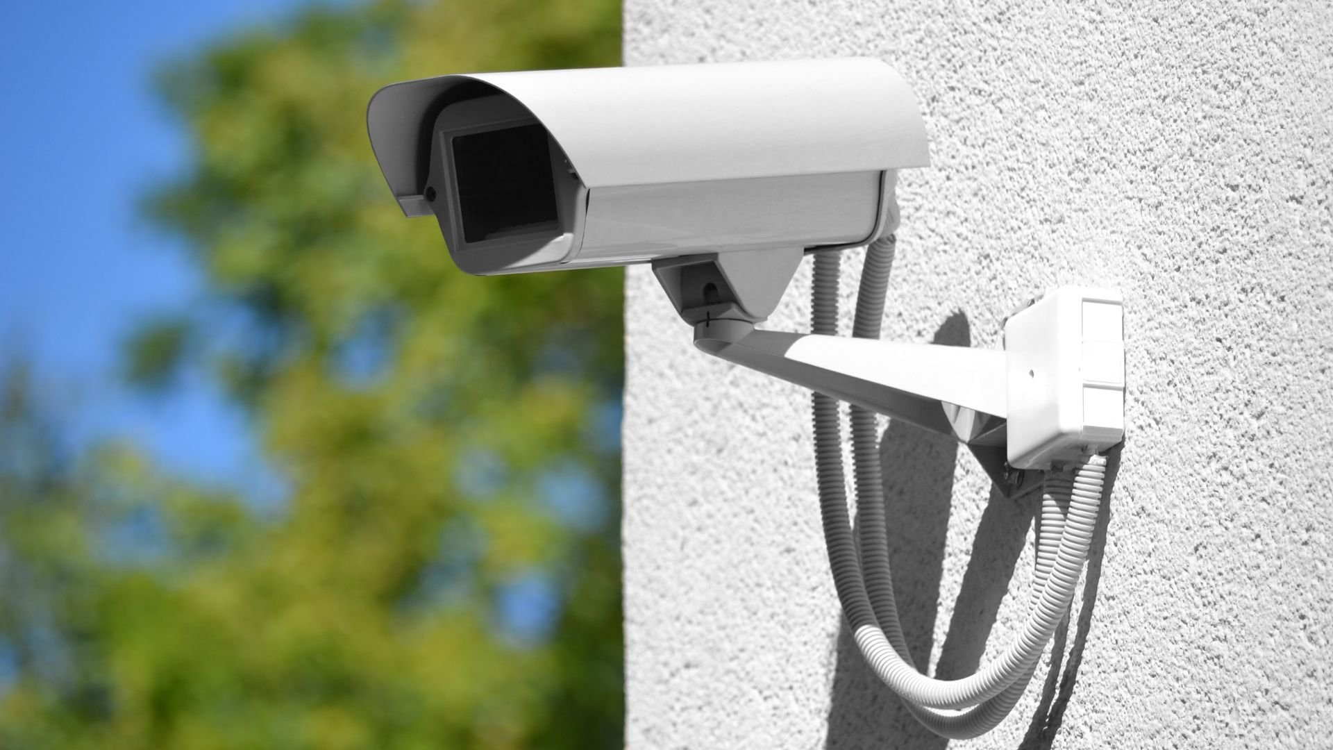 AI powered surveillance camera mounted on wall